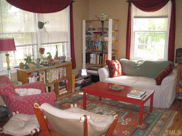 2135 Milburnie Road Raleigh, NC 27610 - Photo 2 of 17 a living room with furniture and a large window