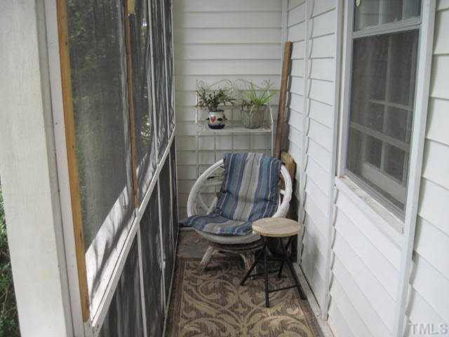 2135 Milburnie Road Raleigh, NC 27610 - Photo 14 of 17 a bathroom with a toilet and a shower