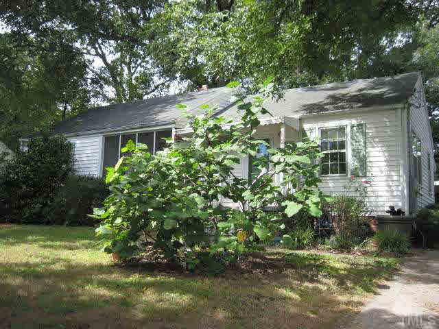 2135 Milburnie Road Raleigh, NC 27610 - Photo 17 of 17 a backyard of a house with lots of green space