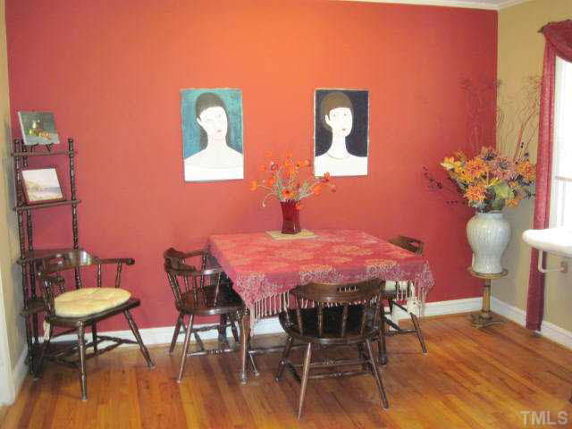 2135 Milburnie Road Raleigh, NC 27610 - Photo 4 of 17 a dining room with furniture and wooden floor