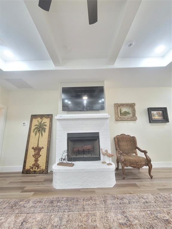 4825 Wichita Street Granbury, TX 76048 - Photo 16 of 30 a living room with furniture and a fireplace