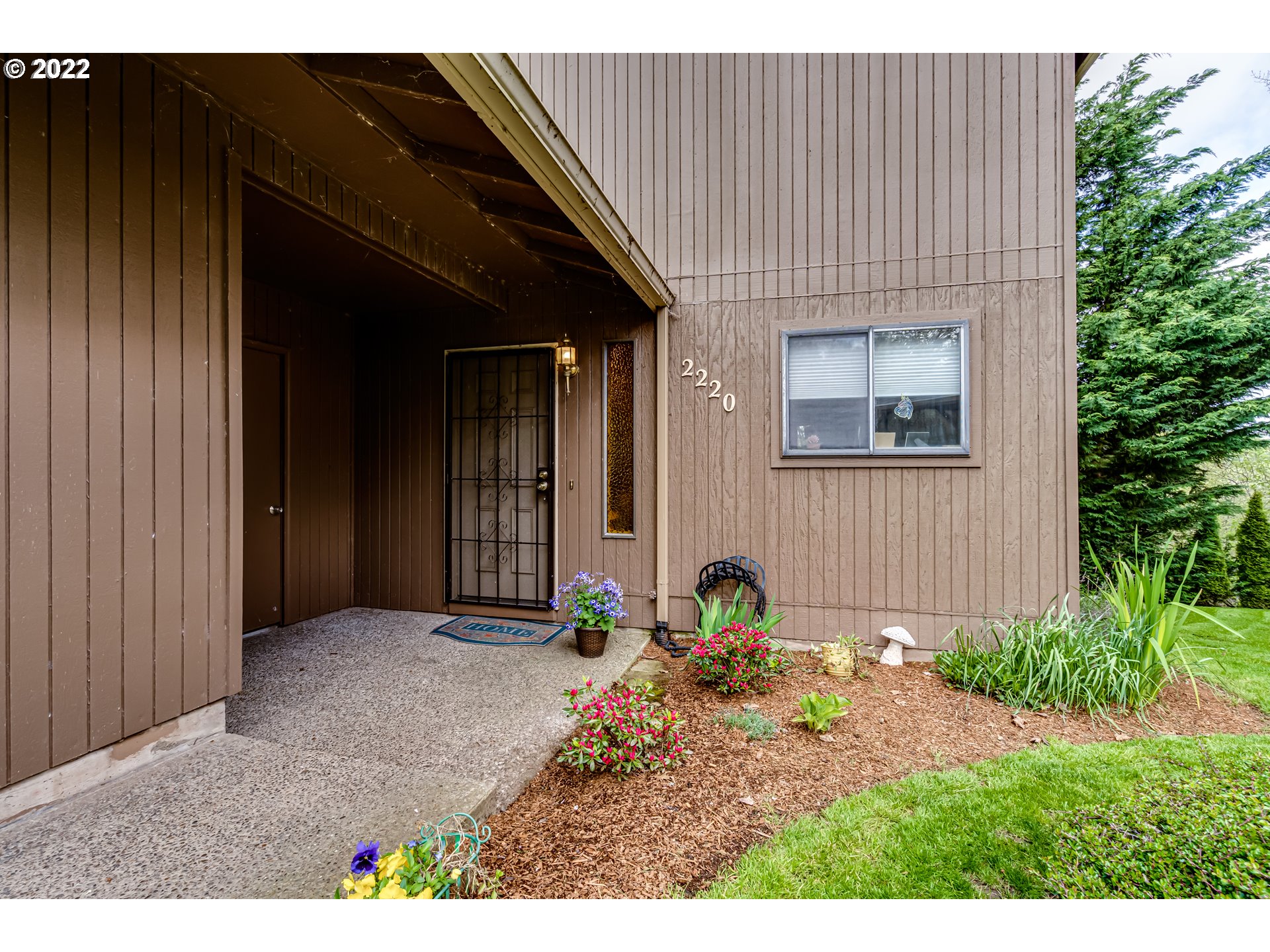 2220 Ridgeway Drive Eugene, OR 97401 - Photo 2 of 32 a view of a house with potted plants