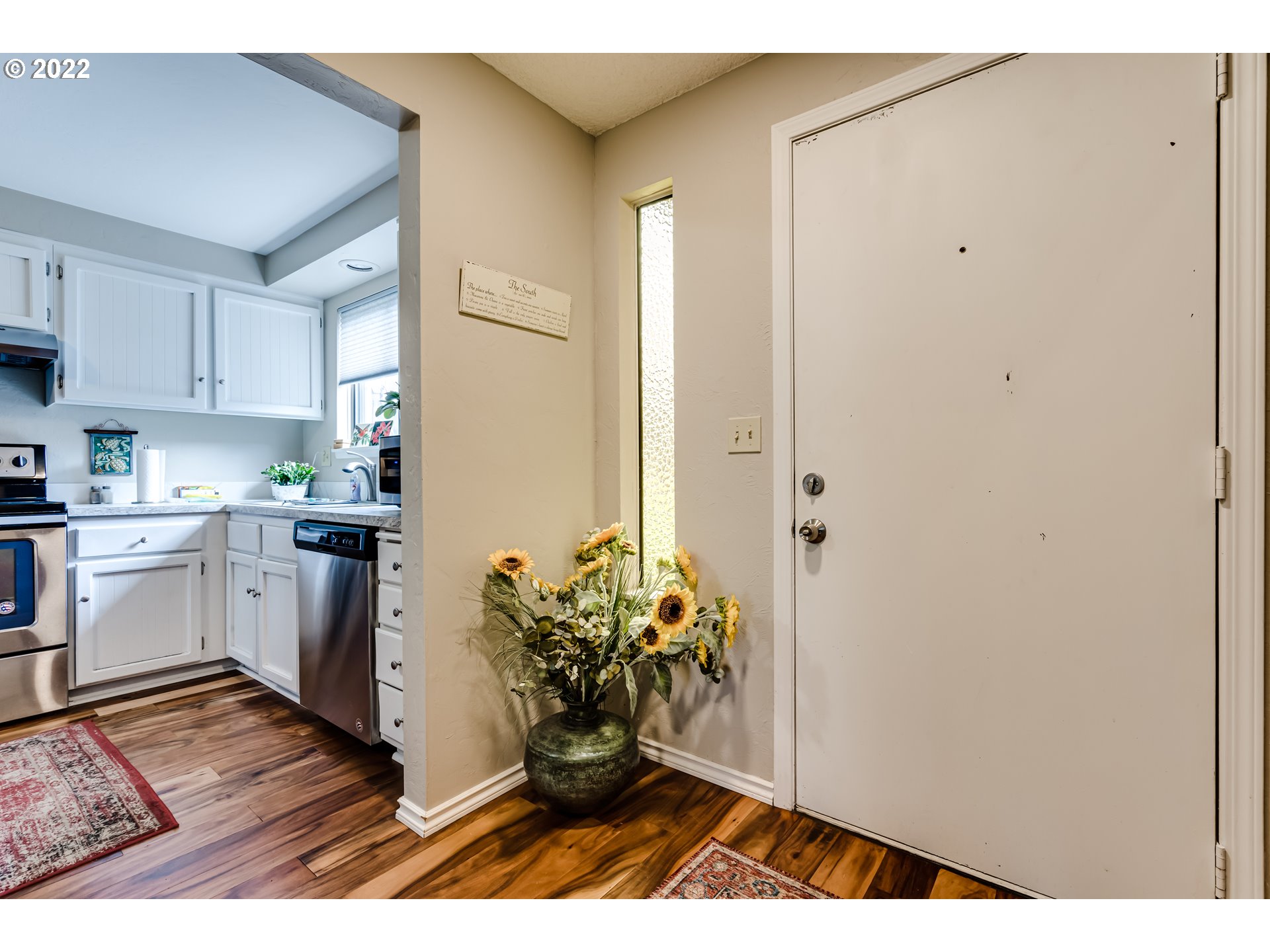 2220 Ridgeway Drive Eugene, OR 97401 - Photo 3 of 32 a kitchen with a sink and a stove top oven