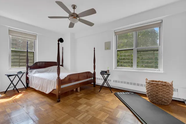 a kitchen with granite countertop a stove top oven and cabinets