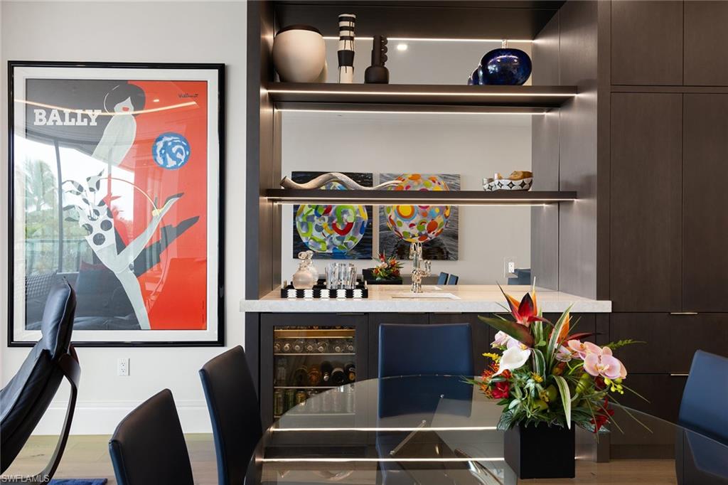 495 5th Street South, Unit 304 Naples, FL 34102 - Photo 16 of 33 a room with stainless steel appliances furniture and decor