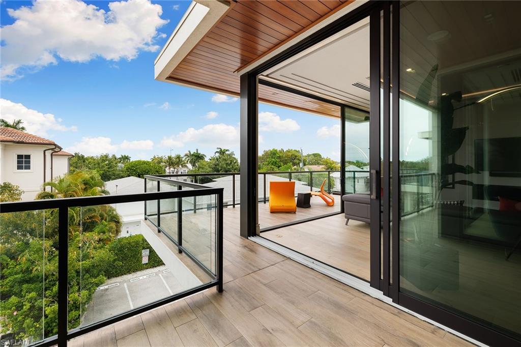 495 5th Street South, Unit 304 Naples, FL 34102 - Photo 29 of 33 a view of a city from a balcony