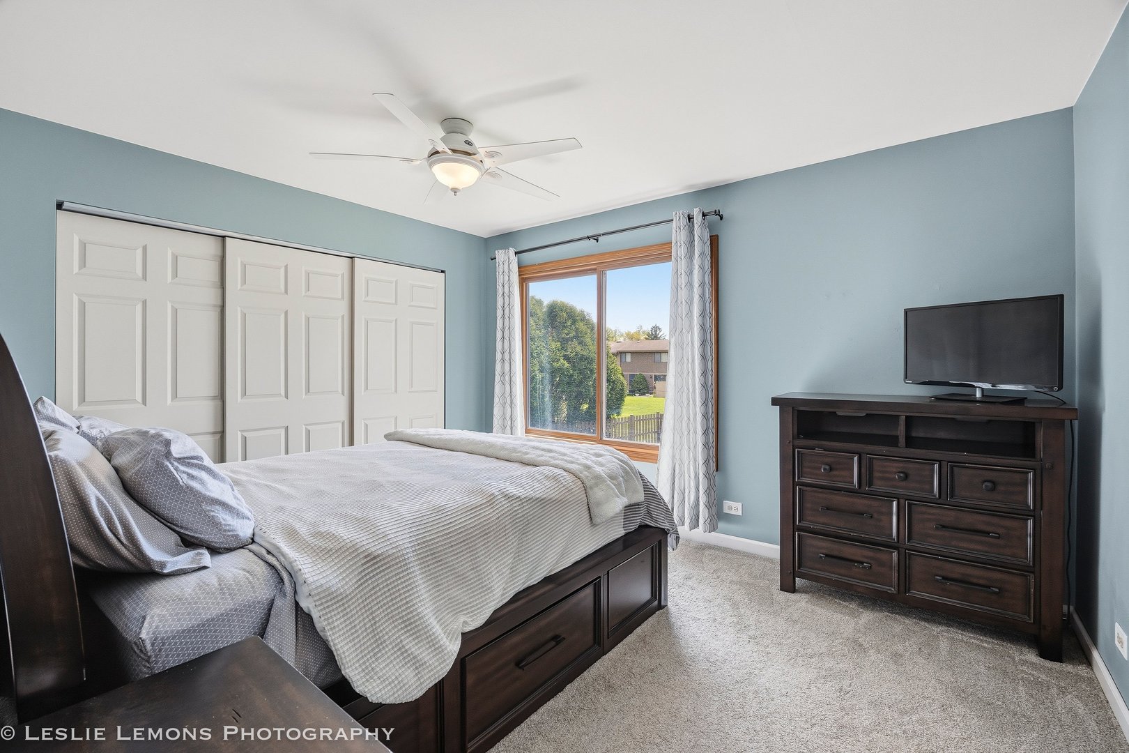 497 Sequoia Trail Roselle, IL 60172 - Photo 12 of 21 a bedroom with a bed and furniture