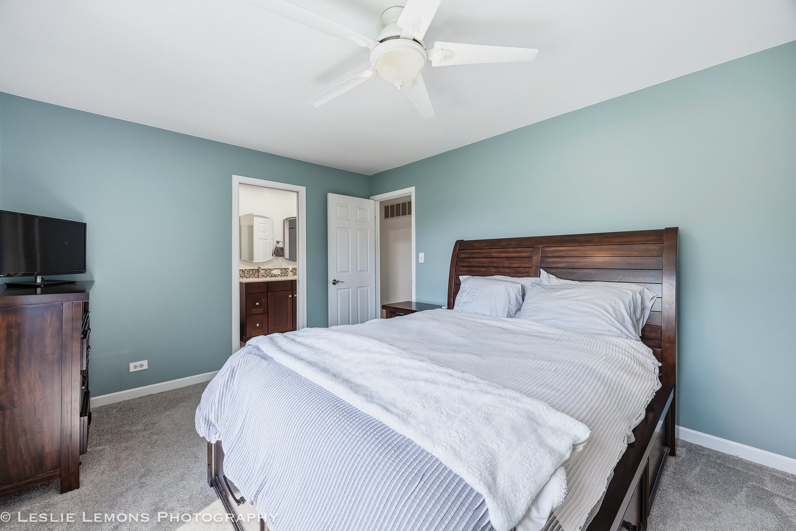 497 Sequoia Trail Roselle, IL 60172 - Photo 13 of 21 a bedroom with a bed and a tv