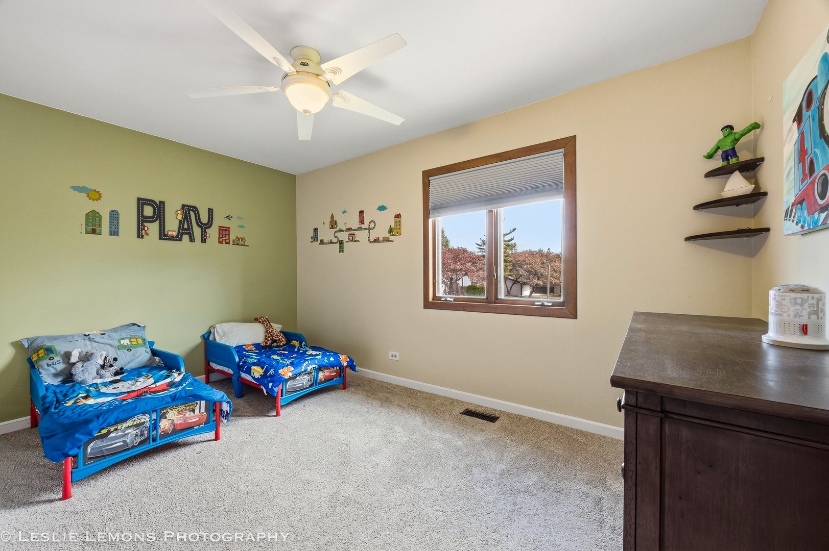 497 Sequoia Trail Roselle, IL 60172 - Photo 15 of 21 a bedroom with a bed and a chandelier