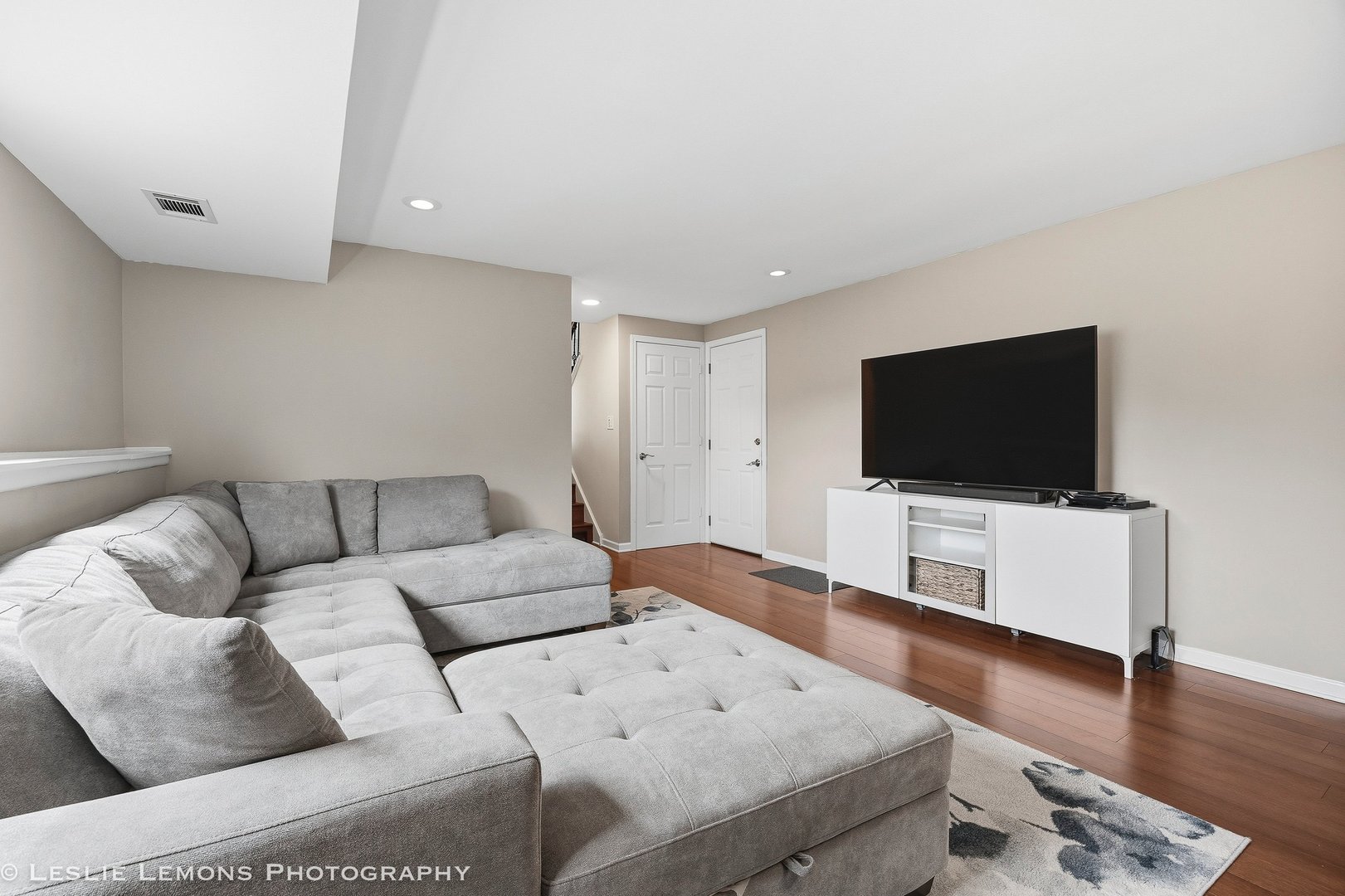 497 Sequoia Trail Roselle, IL 60172 - Photo 19 of 21 a living room with furniture and a flat screen tv