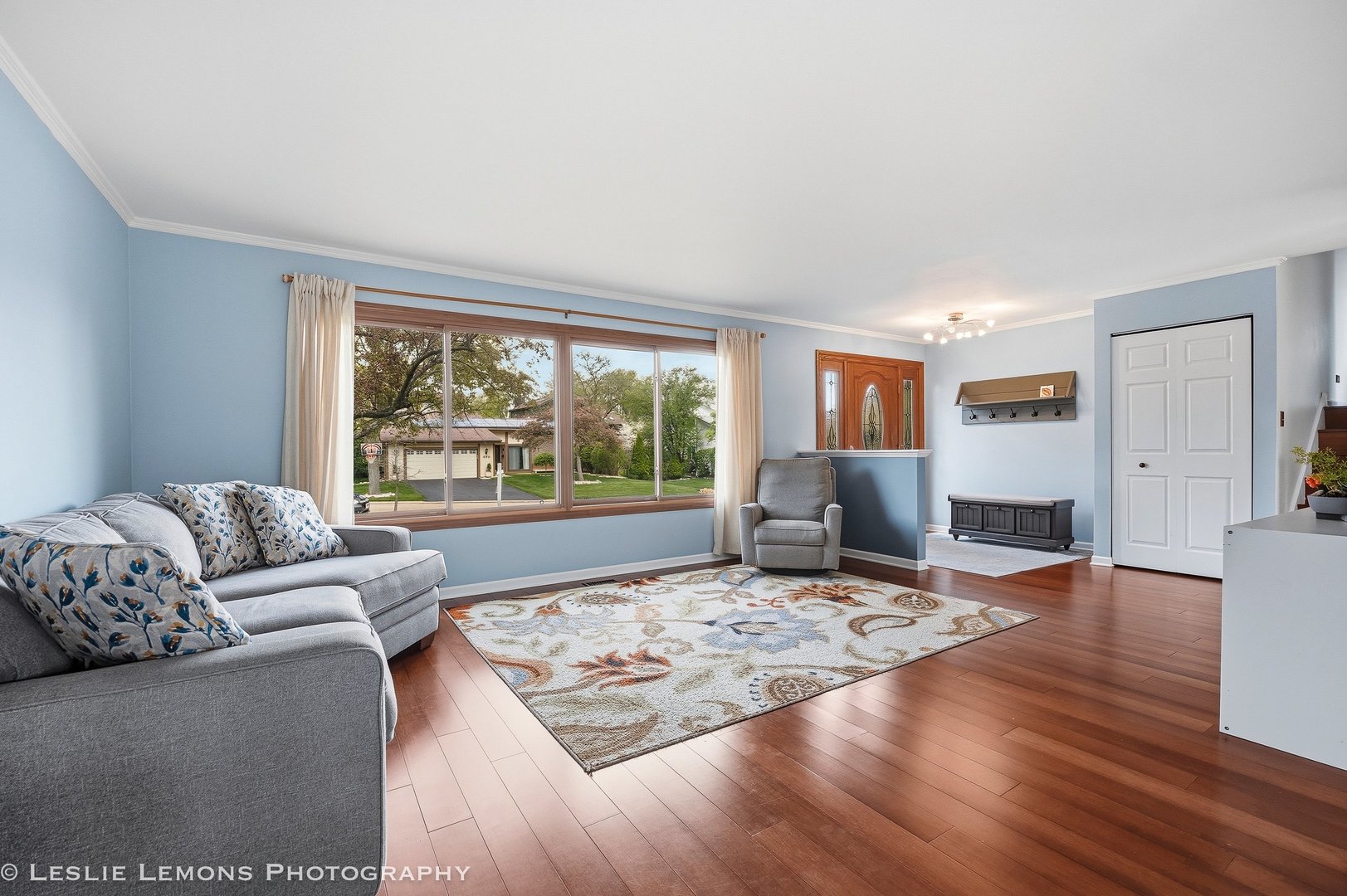 497 Sequoia Trail Roselle, IL 60172 - Photo 6 of 21 a living room with furniture and a wooden floor
