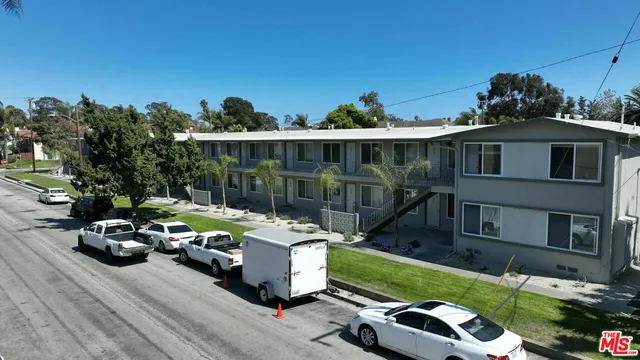 a childrens park with lots of swings and slides