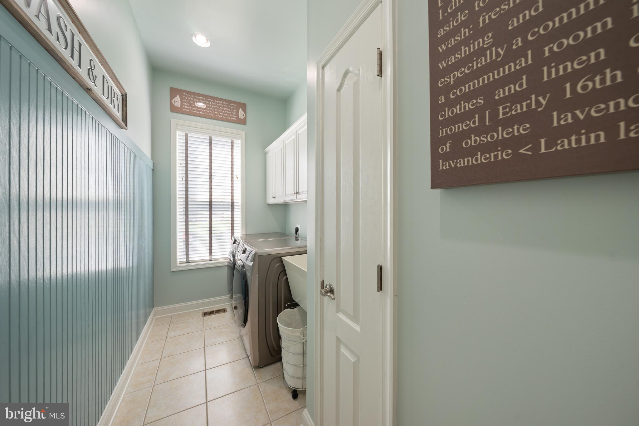 400 Shipyard Way Solomons, MD 20688 - Photo 26 of 100 a view of hallway with a window and a kitchen view