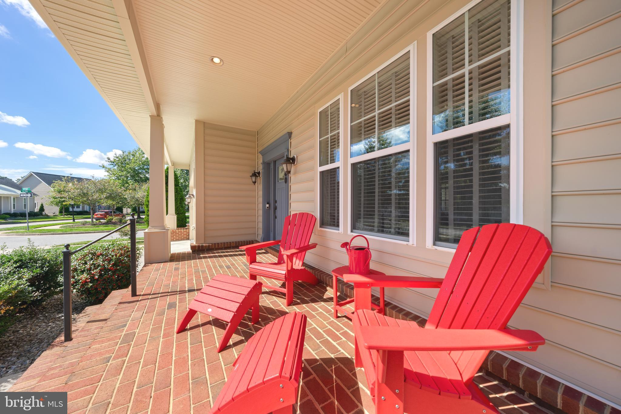 400 Shipyard Way Solomons, MD 20688 - Photo 4 of 100 a backyard of a house with seating space