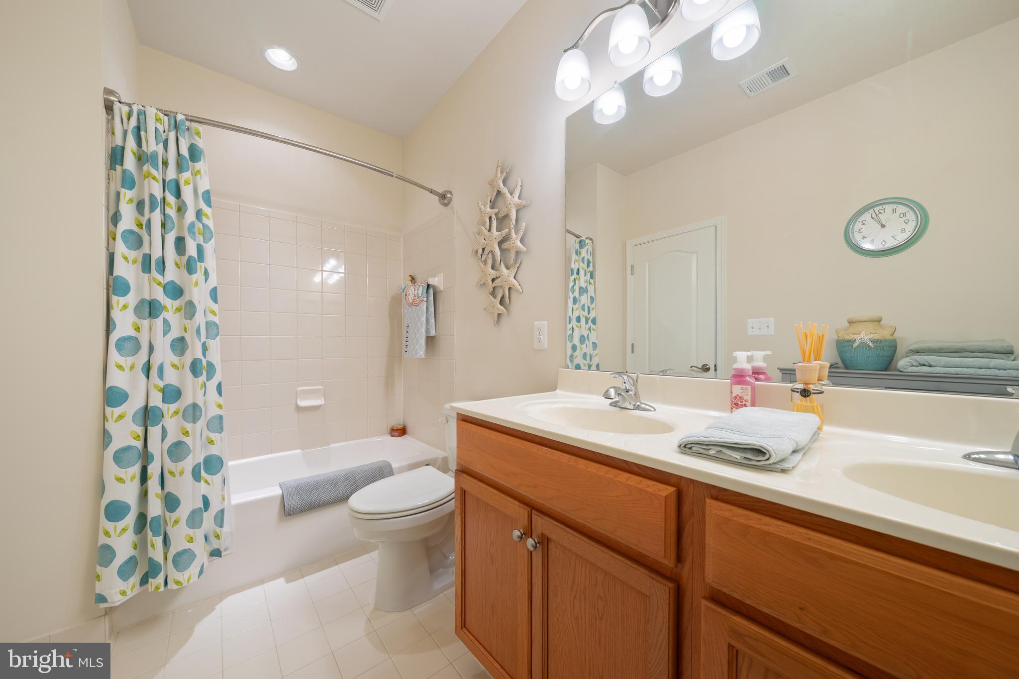 400 Shipyard Way Solomons, MD 20688 - Photo 46 of 100 Upper level Full Bath w/Dual sink vanity