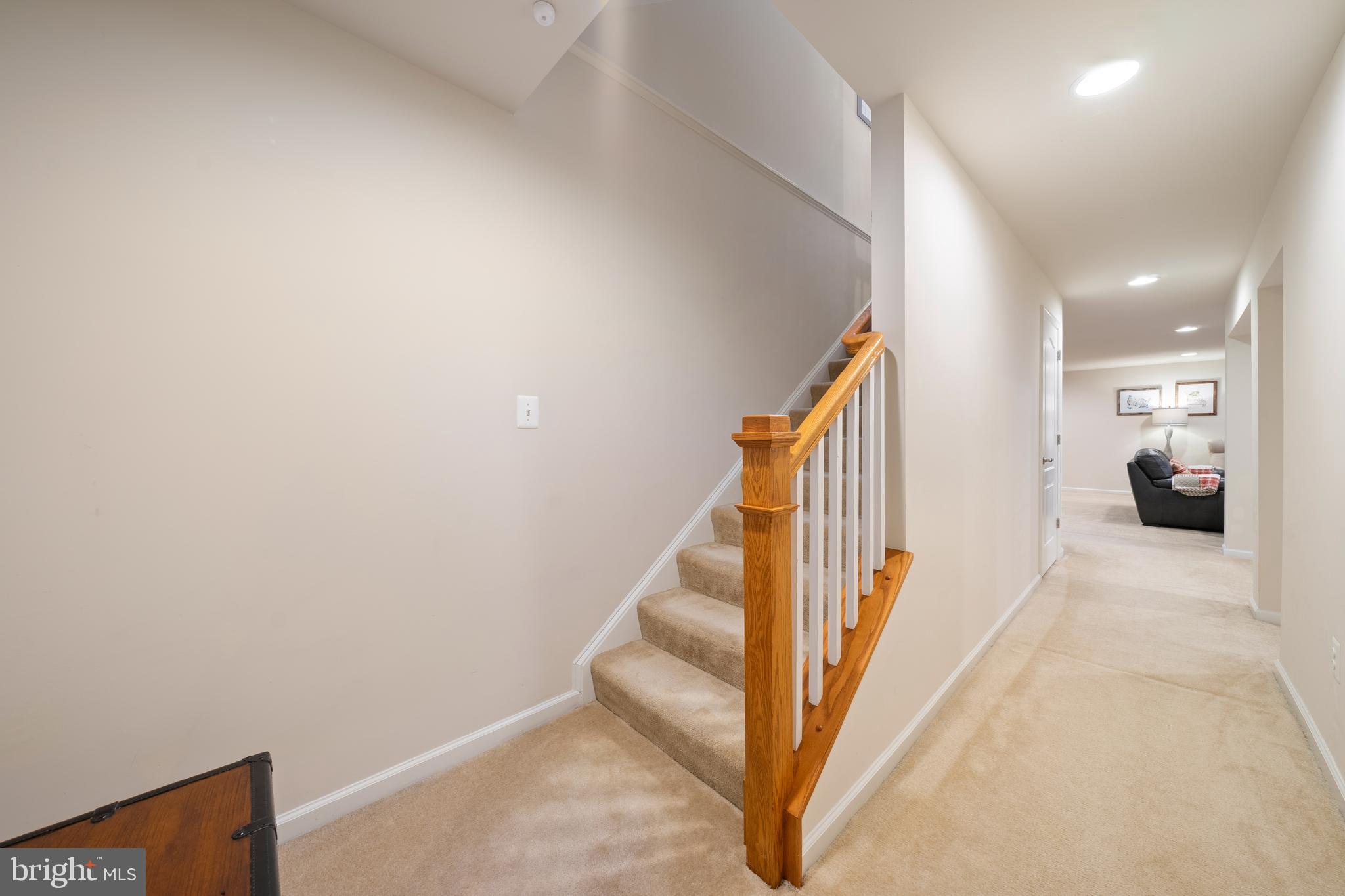 400 Shipyard Way Solomons, MD 20688 - Photo 53 of 100 a view of a hallway with staircase