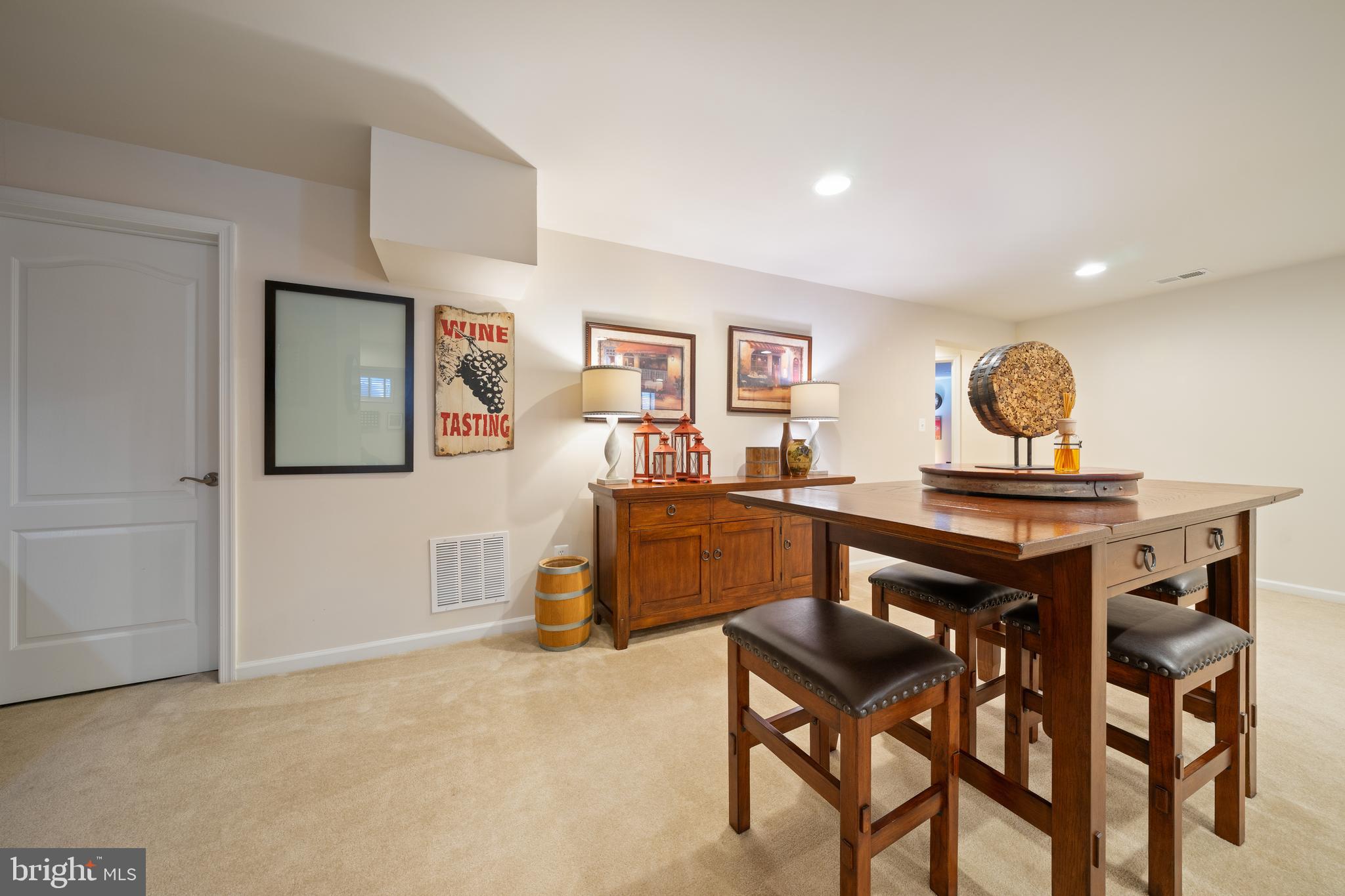 400 Shipyard Way Solomons, MD 20688 - Photo 58 of 100 a living room with a couch and a table