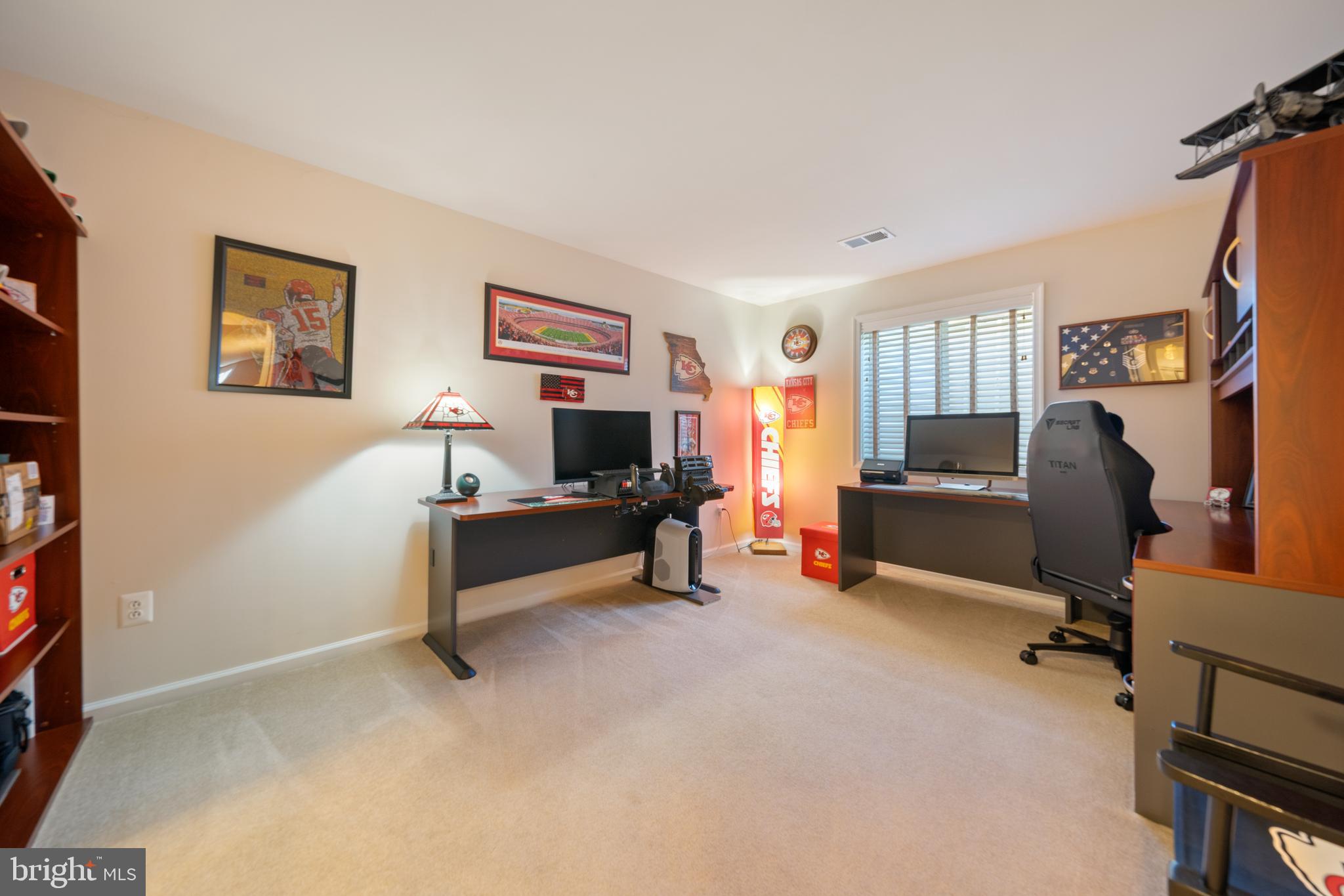 400 Shipyard Way Solomons, MD 20688 - Photo 61 of 100 a living room with furniture and a flat screen tv