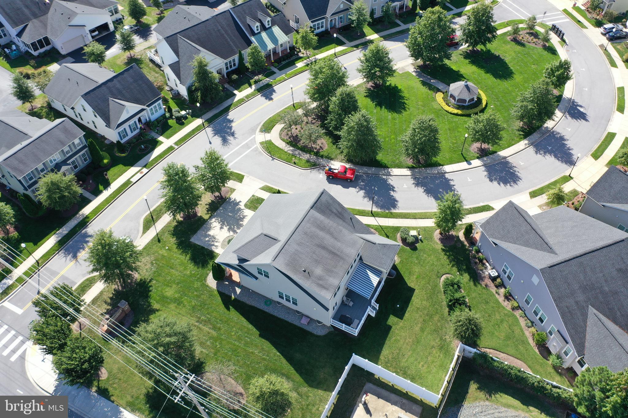400 Shipyard Way Solomons, MD 20688 - Photo 70 of 100 an aerial view of a house with a garden and swimming pool