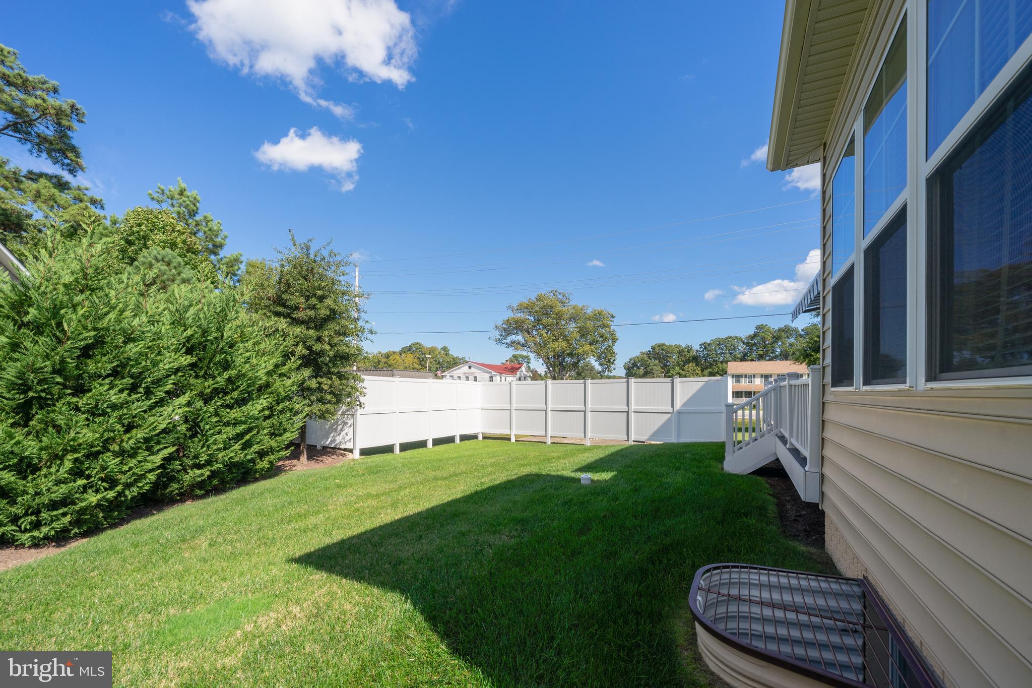 400 Shipyard Way Solomons, MD 20688 - Photo 71 of 100 a view of a patio with a yard