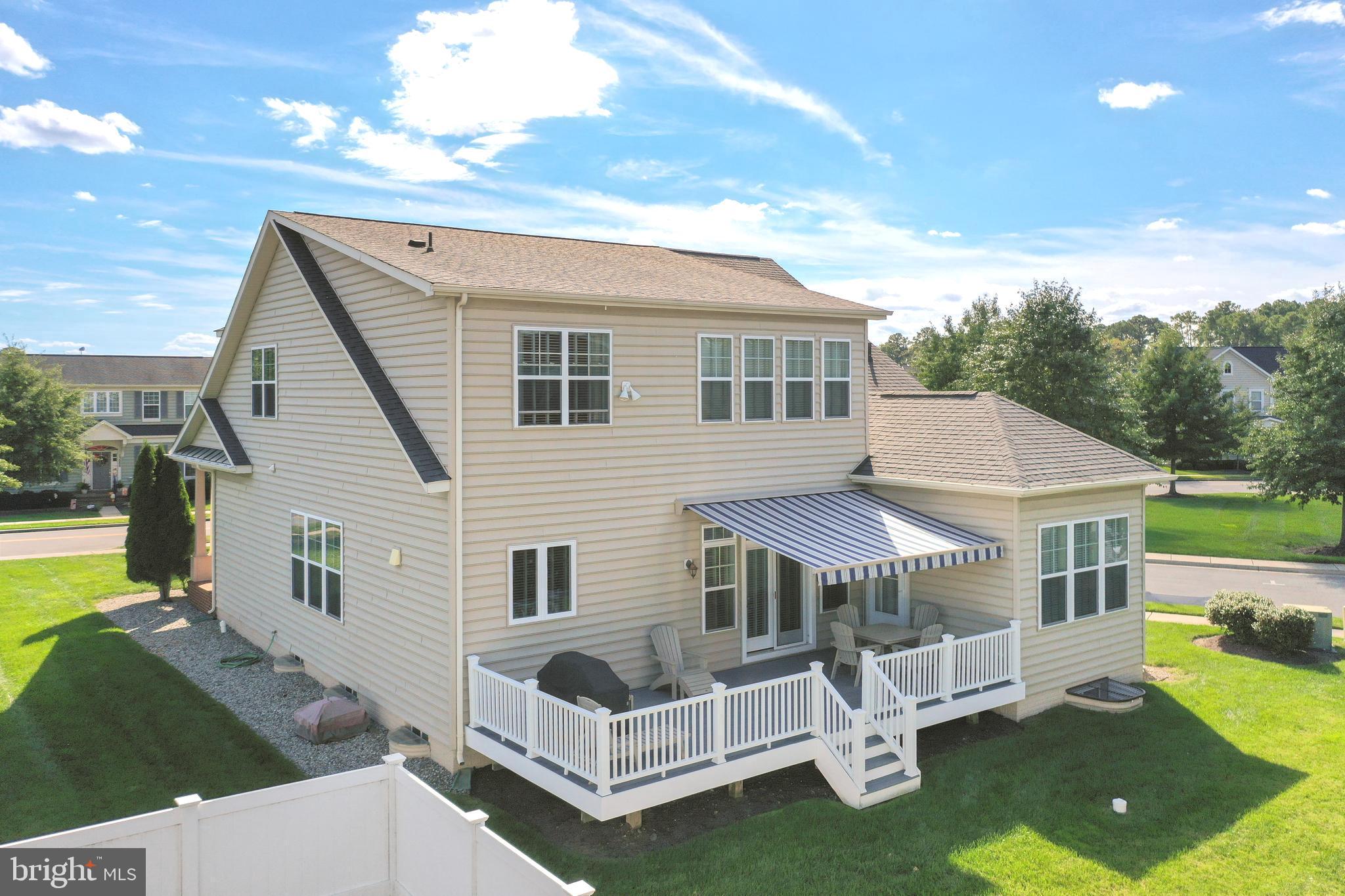 400 Shipyard Way Solomons, MD 20688 - Photo 79 of 100 a view of a house with a yard and furniture