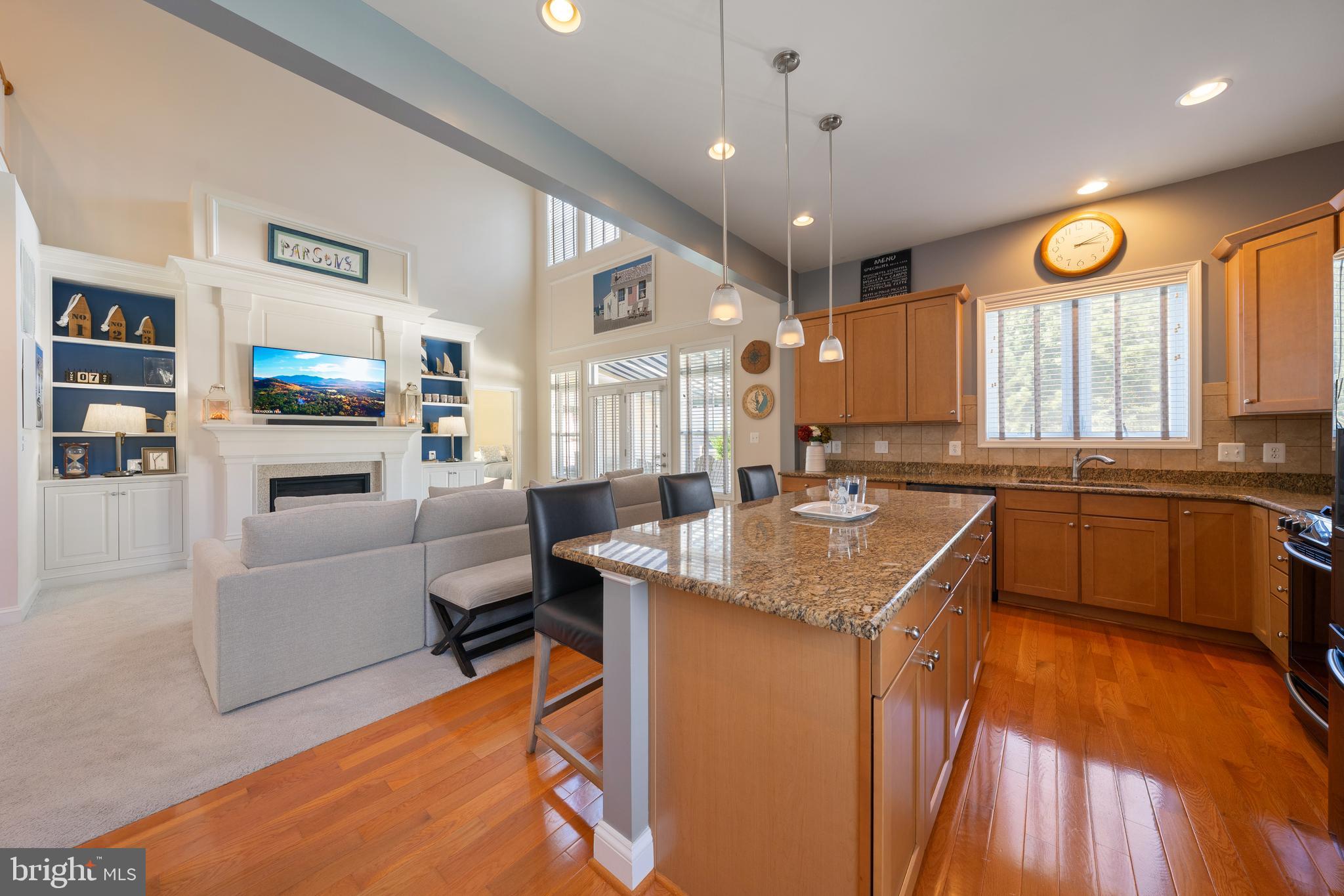 400 Shipyard Way Solomons, MD 20688 - Photo 8 of 100 a kitchen with stainless steel appliances granite countertop sink stove and refrigerator