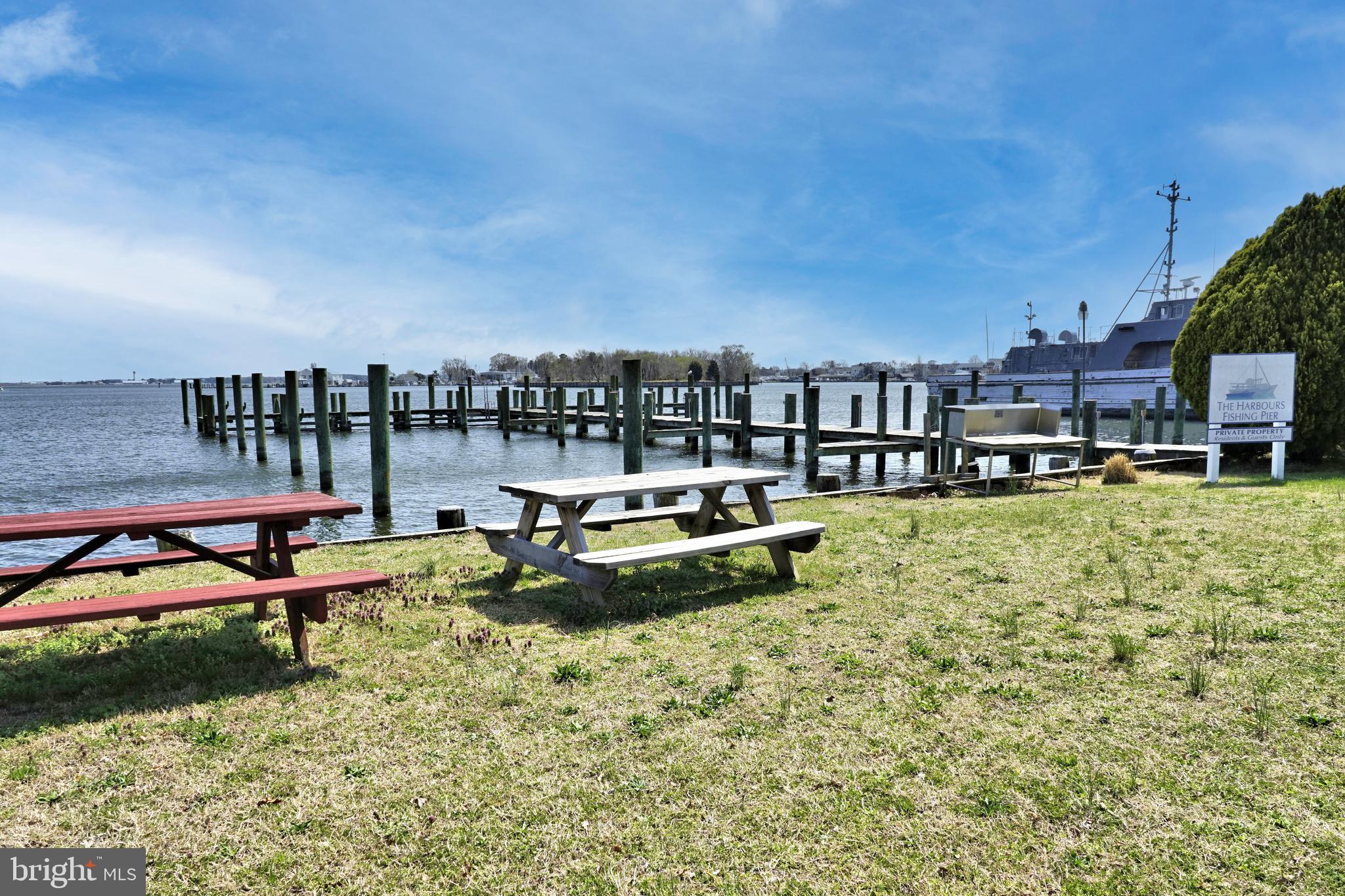 400 Shipyard Way Solomons, MD 20688 - Photo 84 of 100 a view of swimming pool with chairs