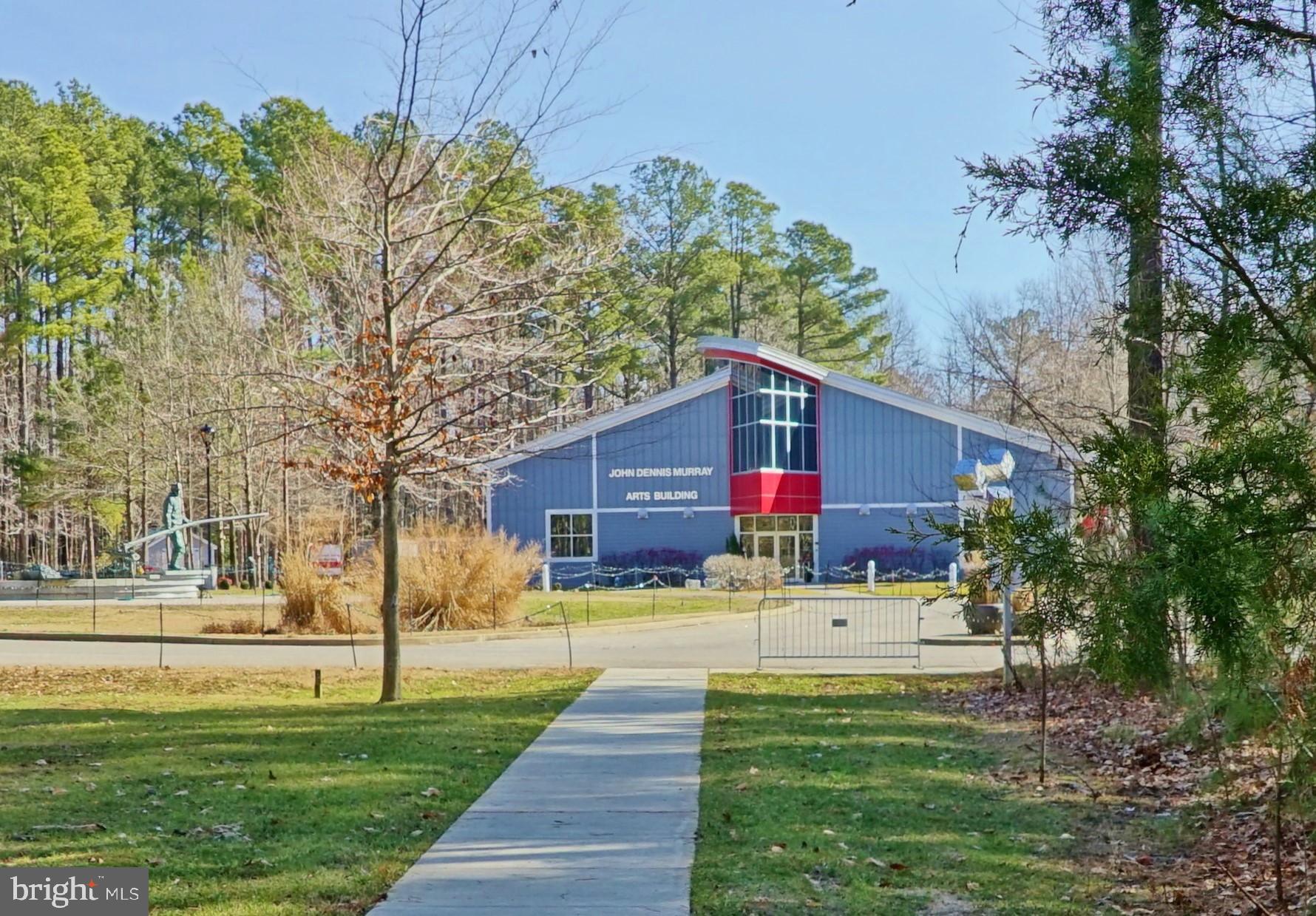 400 Shipyard Way Solomons, MD 20688 - Photo 98 of 100 a front view of a house with a yard