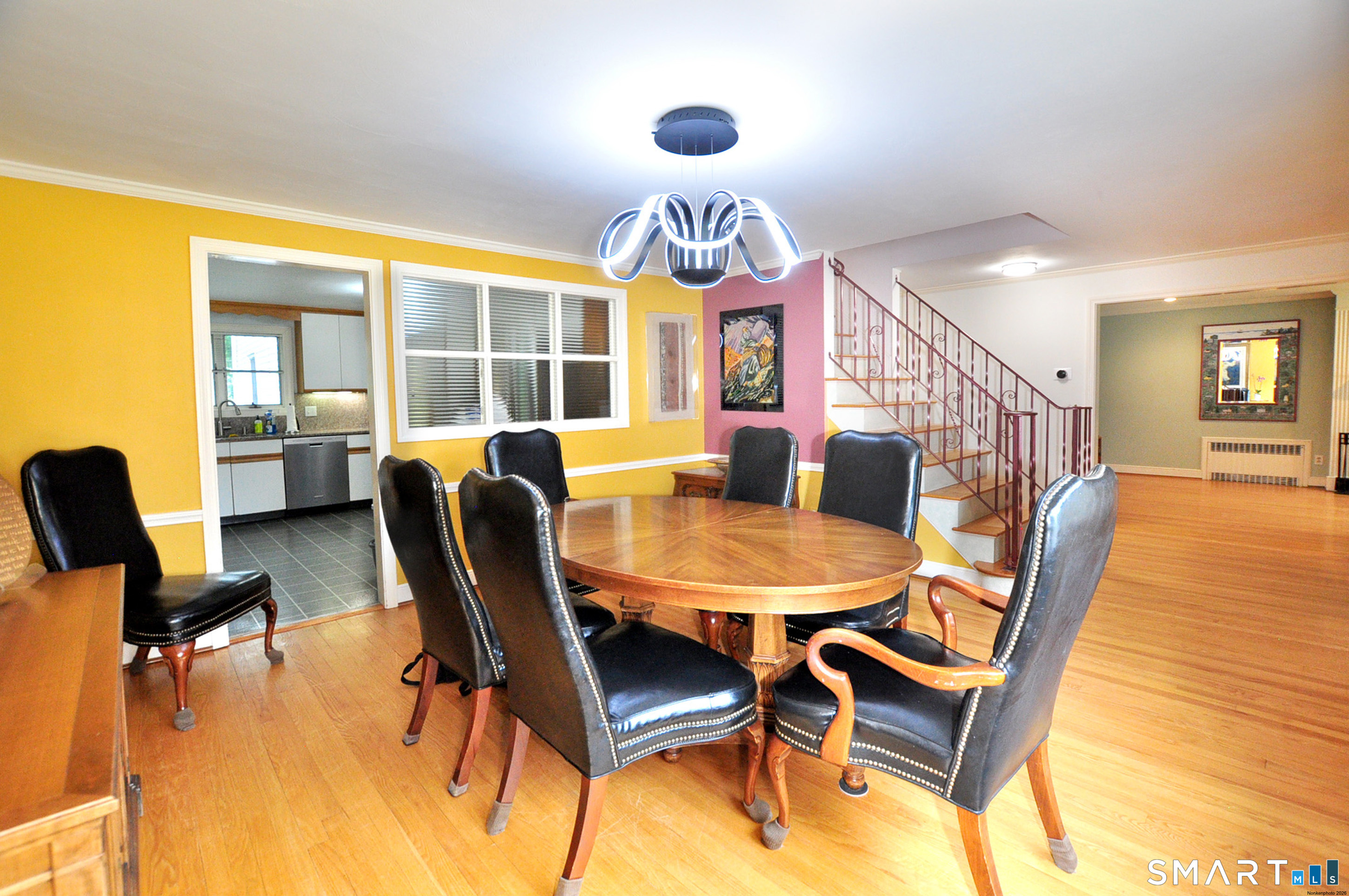 44 Miamis Road West Hartford, CT 06117 - Photo 12 of 39 a view of a dining room with furniture window and wooden floor