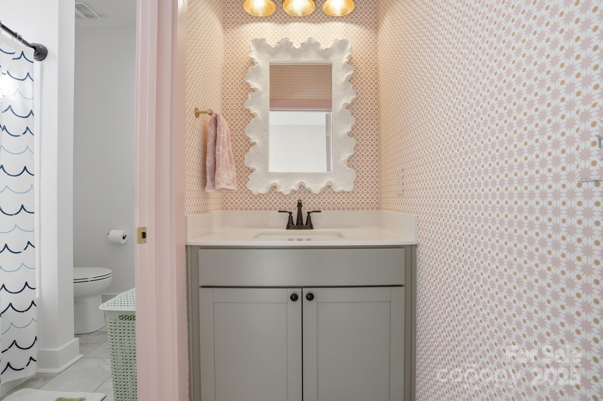 6246 Six String Court Fort Mill, SC 29708 - Photo 16 of 48 a bathroom with a sink toilet and shower