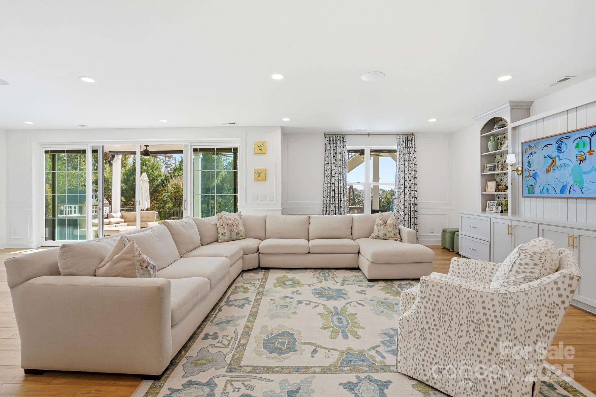 6246 Six String Court Fort Mill, SC 29708 - Photo 31 of 48 a living room with furniture and large windows