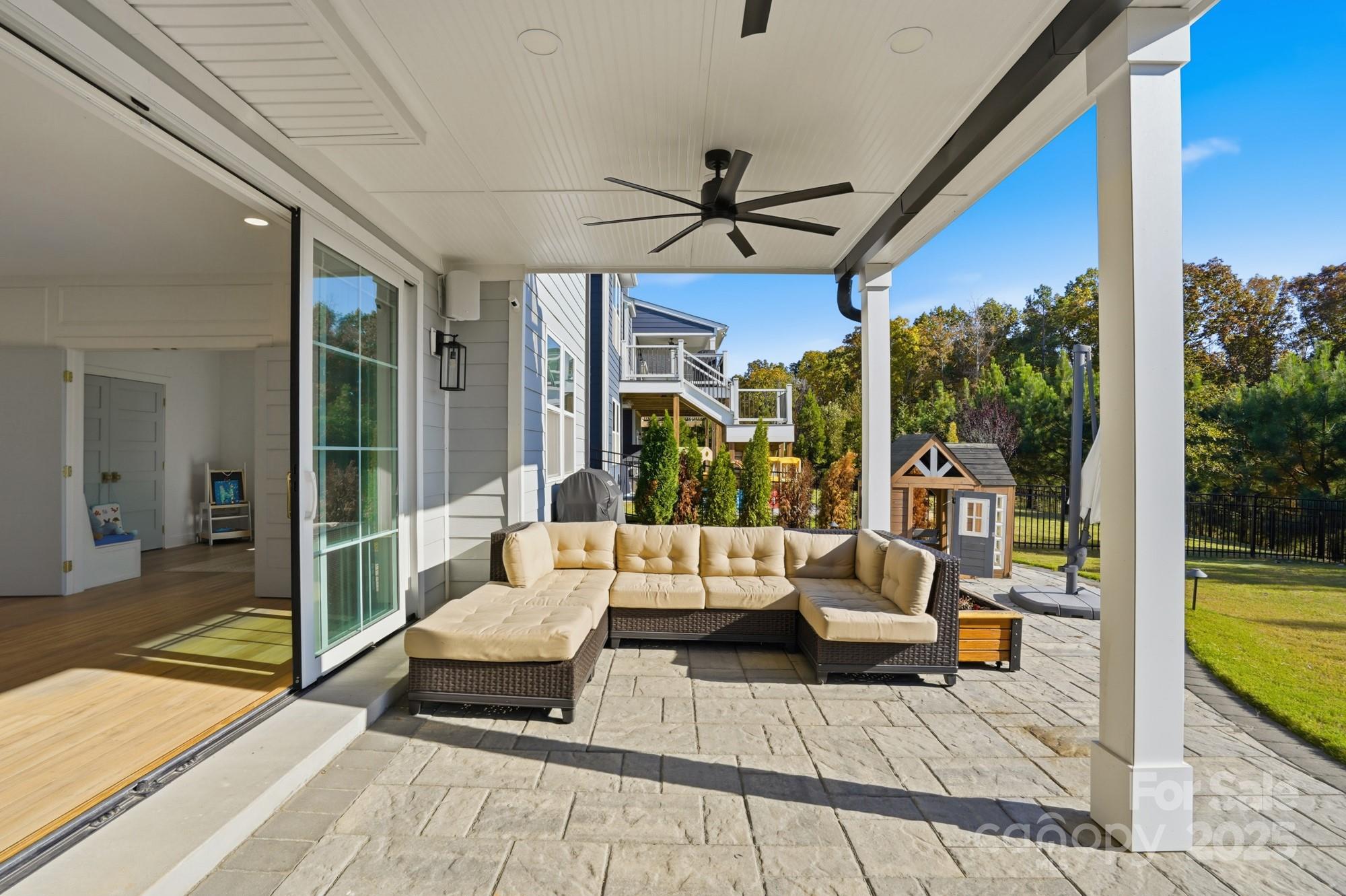 6246 Six String Court Fort Mill, SC 29708 - Photo 38 of 48 a balcony with couch and glass door
