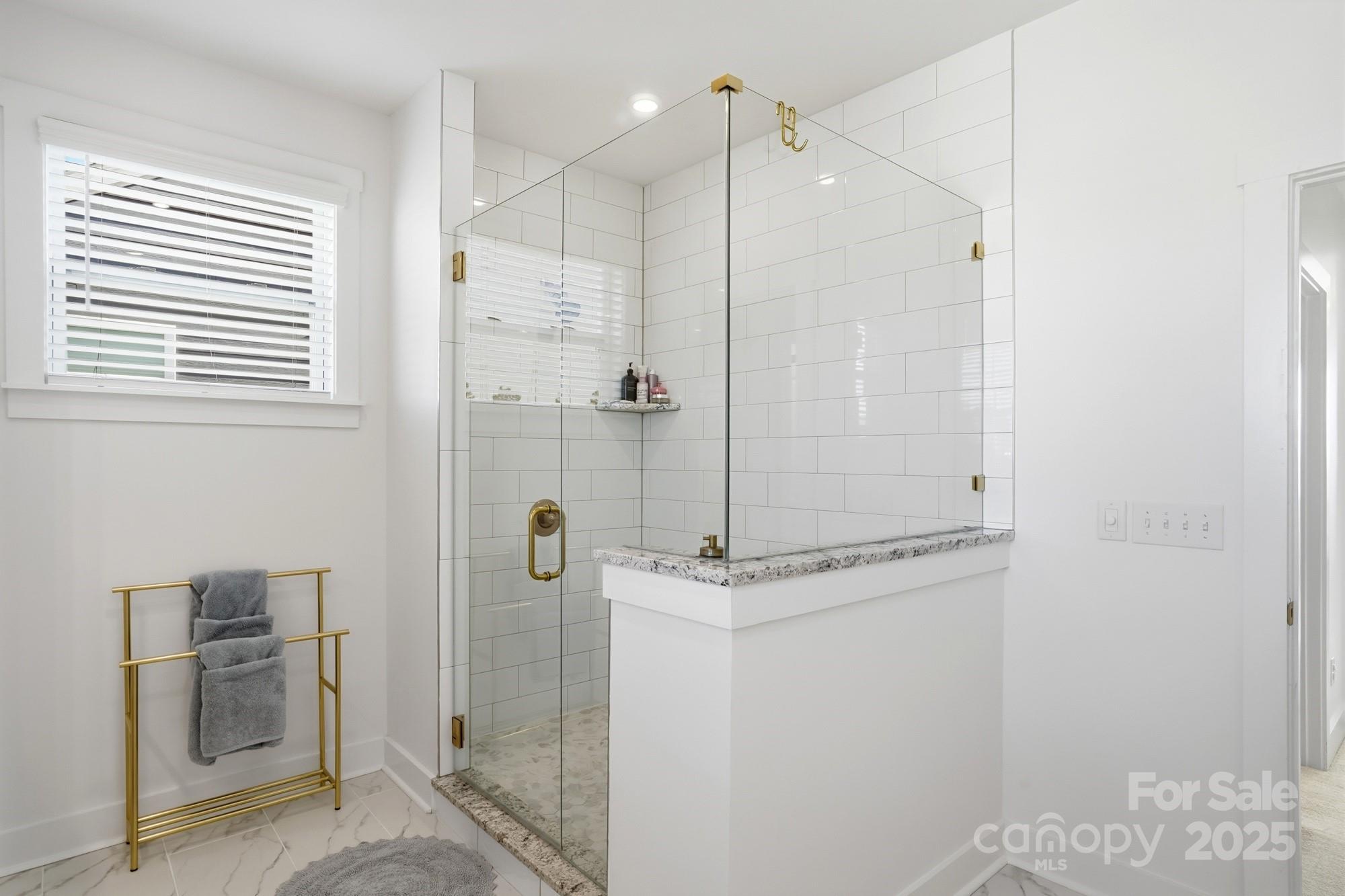 6246 Six String Court Fort Mill, SC 29708 - Photo 10 of 48 a bathroom with a shower and a sink