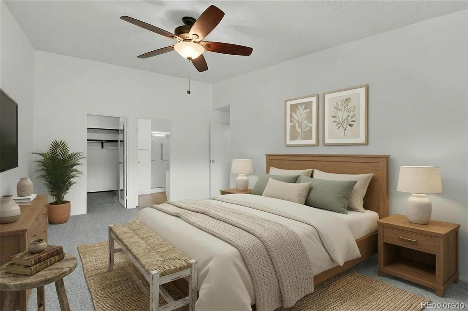 9655 Center Avenue, Unit 9D Denver, CO 80247 - Photo 3 of 21 a bedroom with a bed and a chandelier