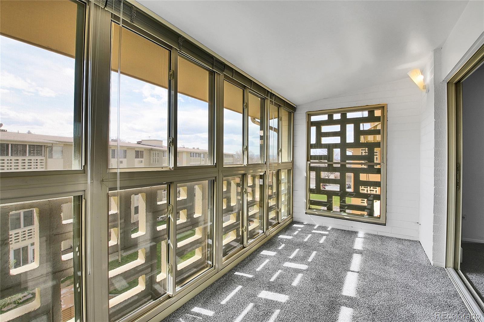 9655 Center Avenue, Unit 9D Denver, CO 80247 - Photo 10 of 21 a view of a large window with an outdoor view
