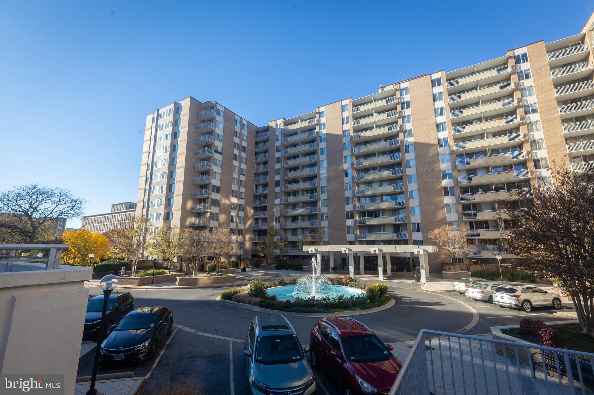 3001 Veazey Terrace Northwest, Unit 1128 Washington, DC 20008 - Photo 13 of 22 a building view with outdoor space