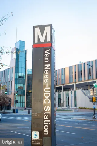 a sign on a pole on a street