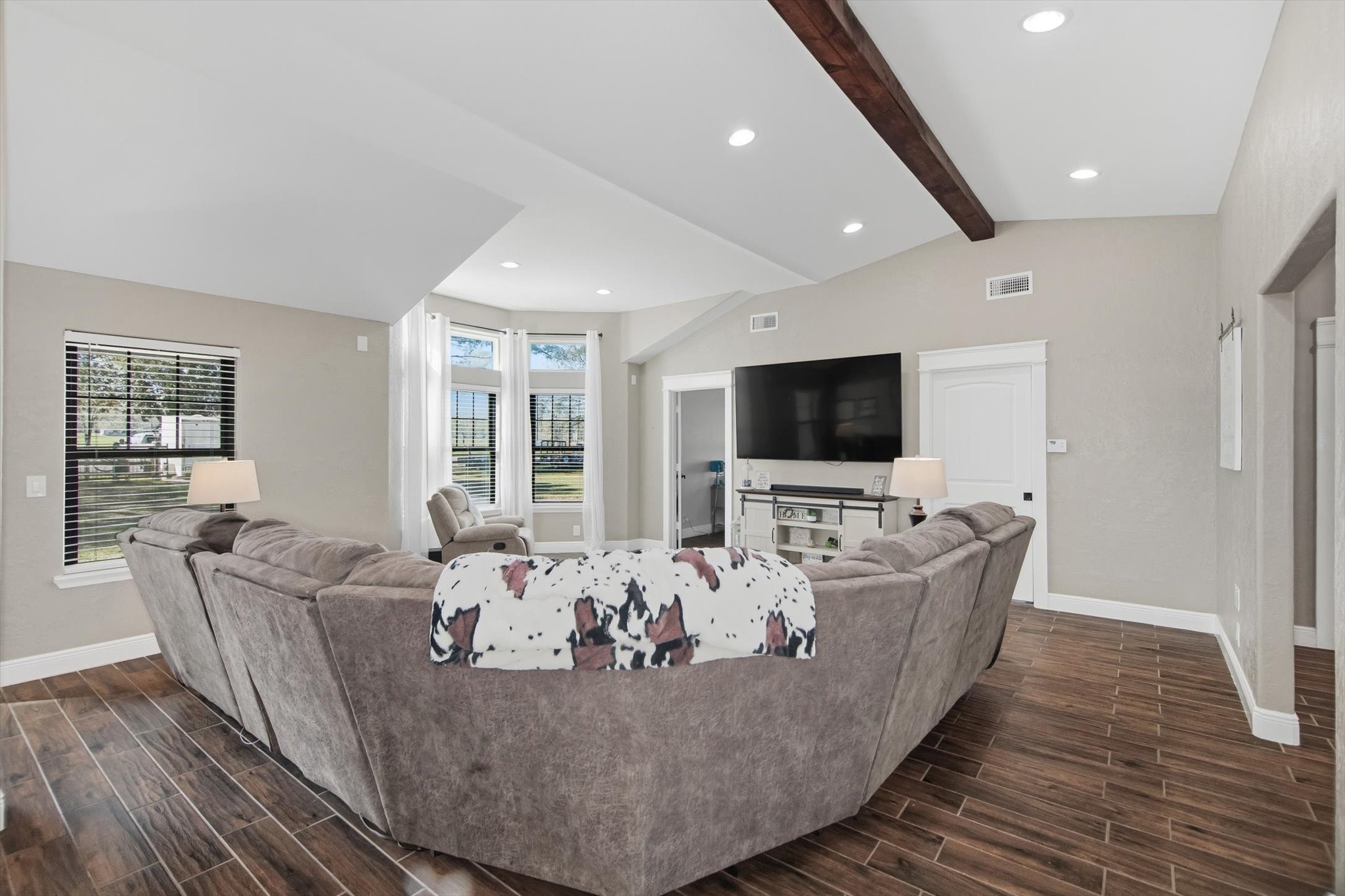 9711 Highway 150 Shepherd, TX 77371 - Photo 11 of 48 a living room with furniture and a flat screen tv