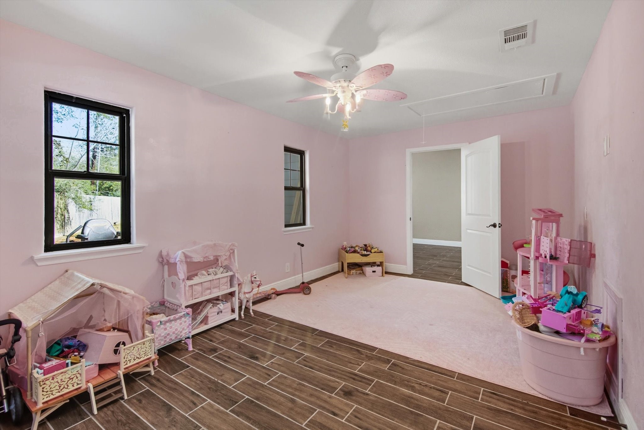 9711 Highway 150 Shepherd, TX 77371 - Photo 25 of 48 a bedroom with a bed dresser and a window