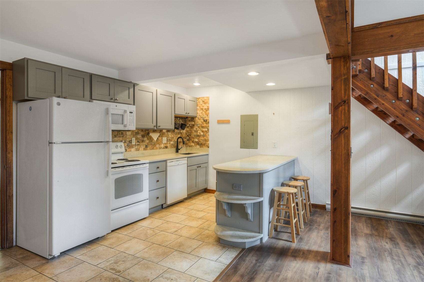 132 Illinois Gulch Road, Unit 3 Breckenridge, CO 80424 - Photo 5 of 32 a kitchen with a refrigerator a stove and a sink