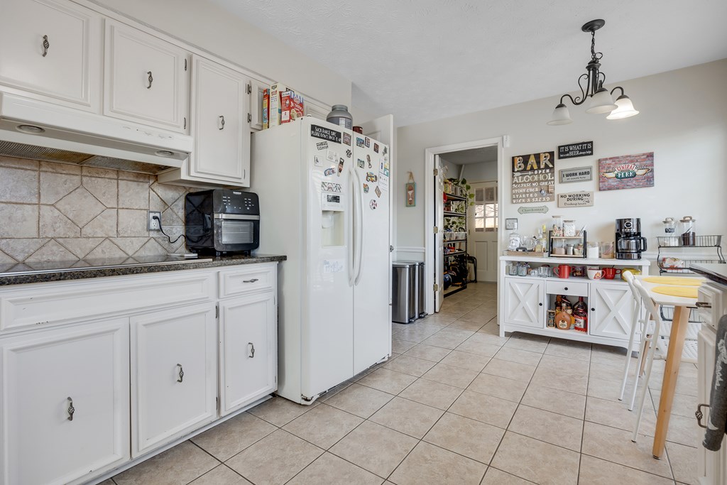 2 Biltmore Court Columbus, GA 31909 - Photo 13 of 29 a kitchen with refrigerator and cabinets