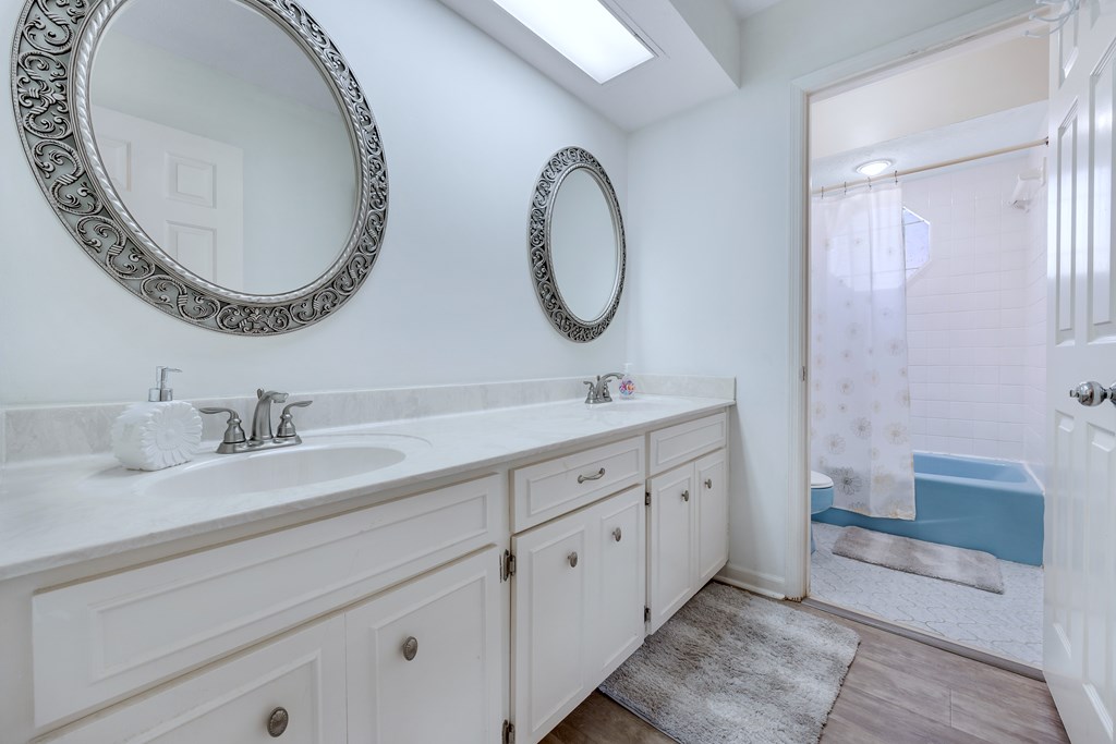 2 Biltmore Court Columbus, GA 31909 - Photo 23 of 29 a spacious bathroom with a double vanity sink and a mirror