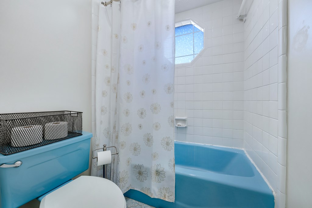 2 Biltmore Court Columbus, GA 31909 - Photo 24 of 29 a bathroom with a toilet and a bathtub