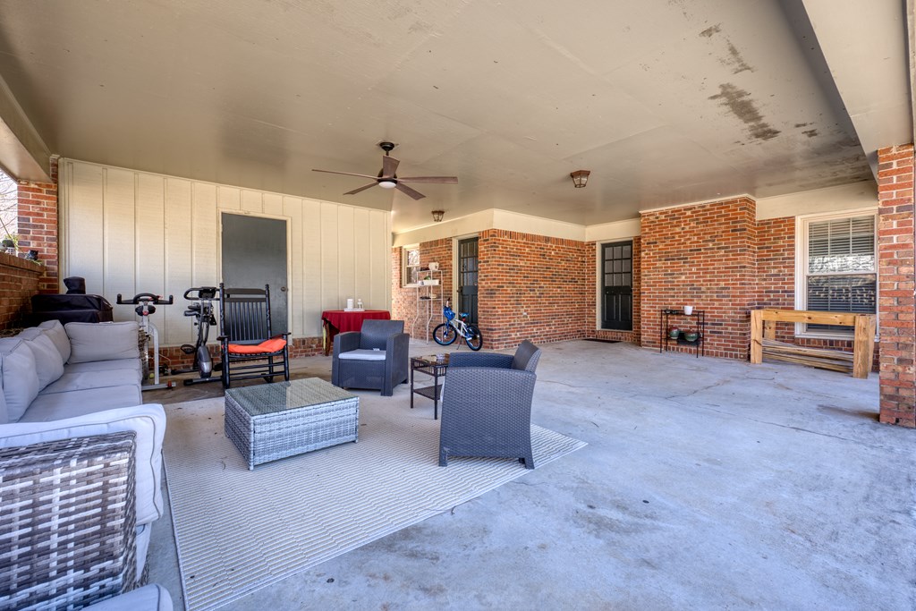 2 Biltmore Court Columbus, GA 31909 - Photo 27 of 29 a living room with furniture and a fireplace