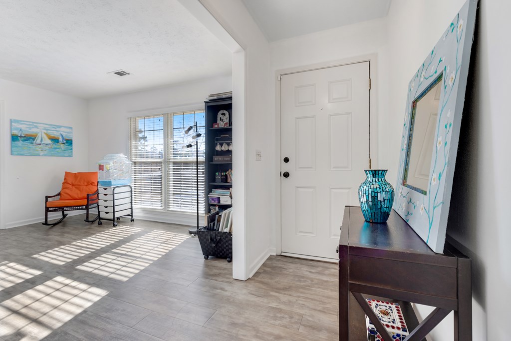 2 Biltmore Court Columbus, GA 31909 - Photo 3 of 29 a living room with furniture and a potted plant