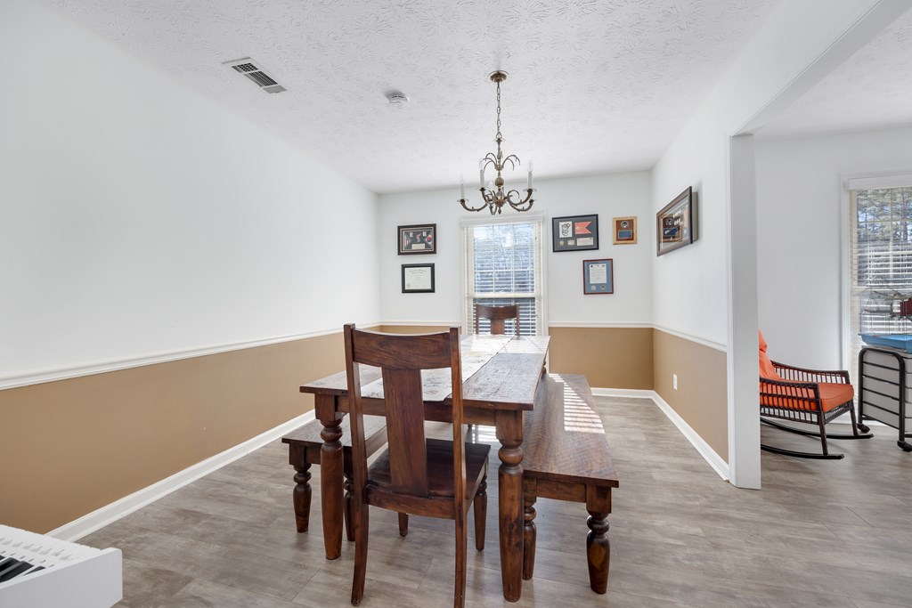 2 Biltmore Court Columbus, GA 31909 - Photo 6 of 29 a view of a dining room with furniture and wooden floor