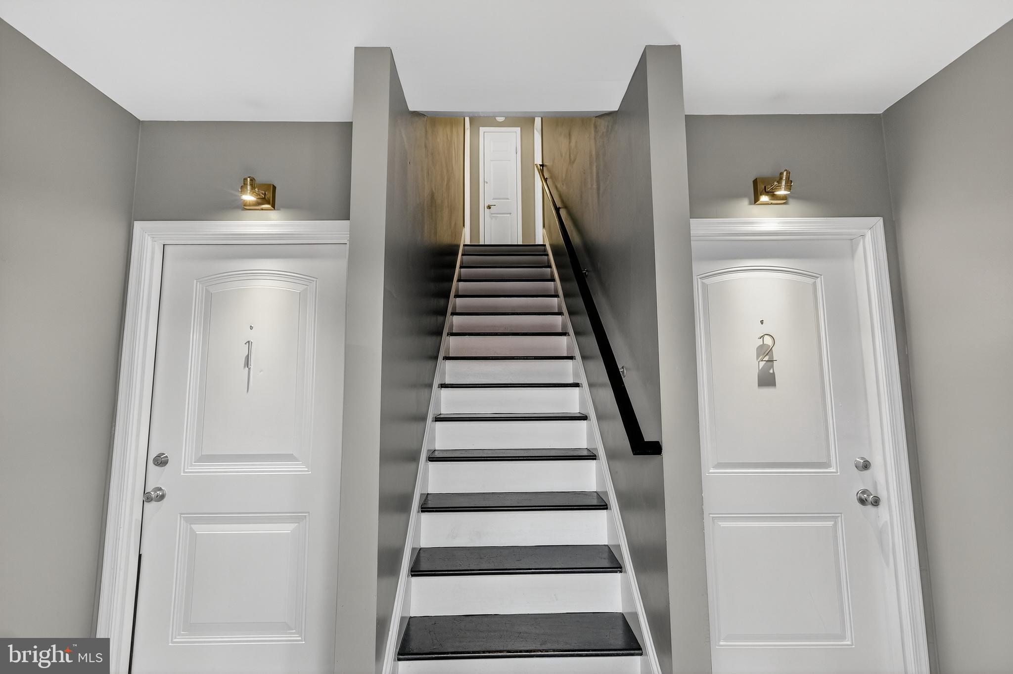 5619 1st Place Northwest, Unit 4 Washington, DC 20011 - Photo 4 of 24 a view of entryway and hall with wooden floor
