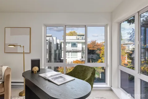 a view of a dining room with furniture