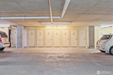 a view of a brick building with large windows