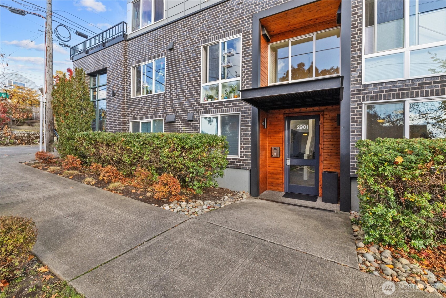 2901 South Jackson Street, Unit 507 Seattle, WA 98144 - Photo 24 of 29 a view of a brick building with large windows